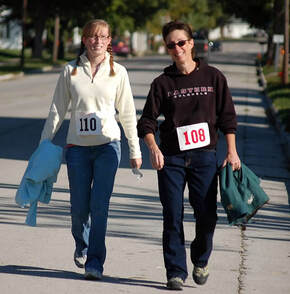 Walking with my mom in the 2008 Pumpkin Dash.